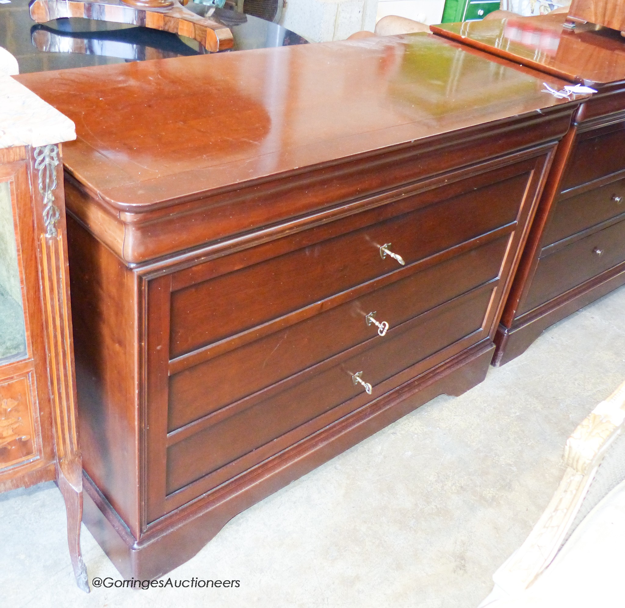 A reproduction French style mahogany four drawer chest, width 118cm, depth 51cm, height 83cm